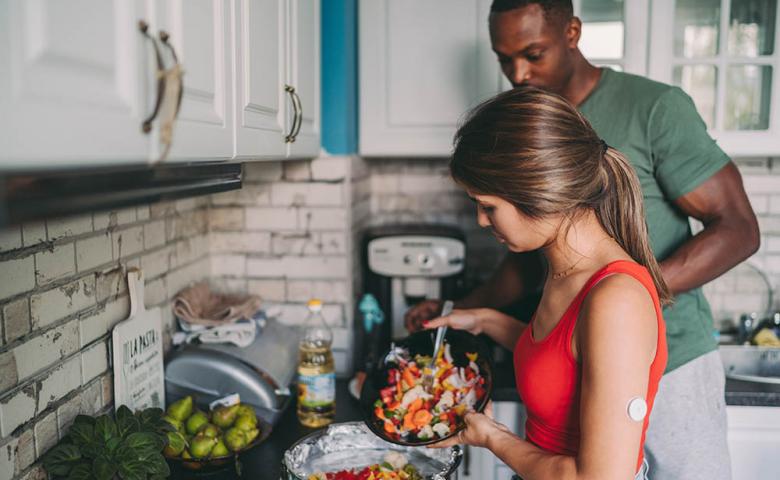 young couple making healthy meal