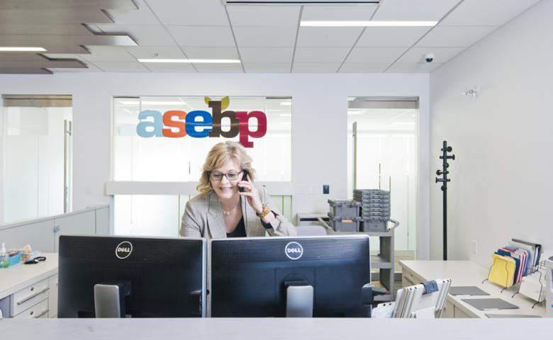 ASEBP receptionist answering a call